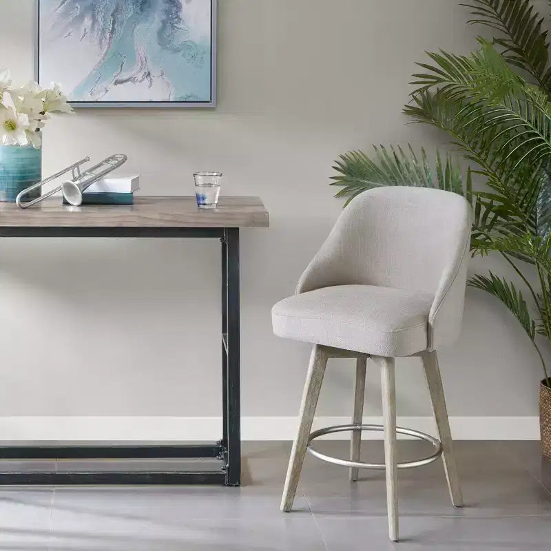 Tabouret de bar à hauteur de comptoir et assise pivotante